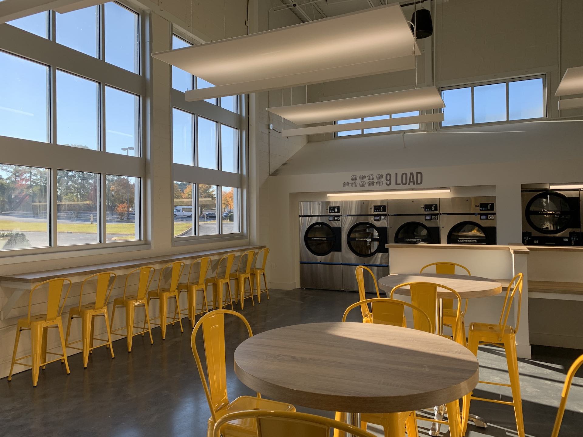 Wide view of Oz Laundry showing the 9-load washers